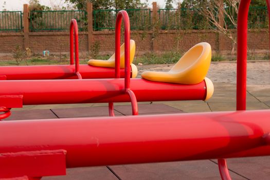 Modern colorful children playground in public park Children playground,seesaw