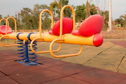 Modern colorful children playground in public park Children playground,seesaw