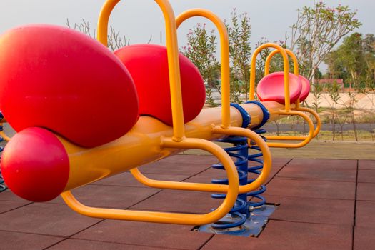 Modern colorful children playground in public park Children playground,seesaw