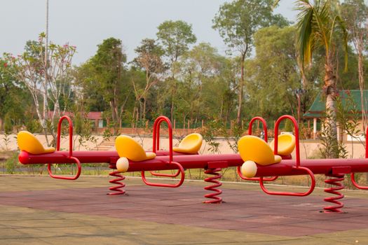 Modern colorful children playground in public park Children playground,seesaw