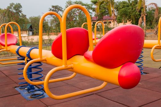 Modern colorful children playground in public park Children playground,seesaw