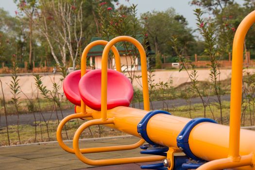 Modern colorful children playground in public park Children playground,seesaw