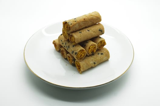Thai rolled wafer stacking on dish