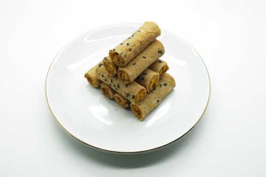 Thai rolled wafer stacking on dish