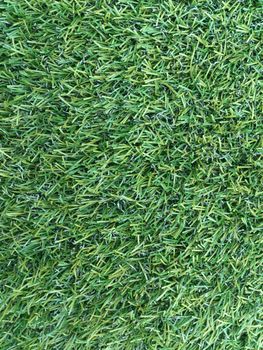 Green artificial grass soccer field