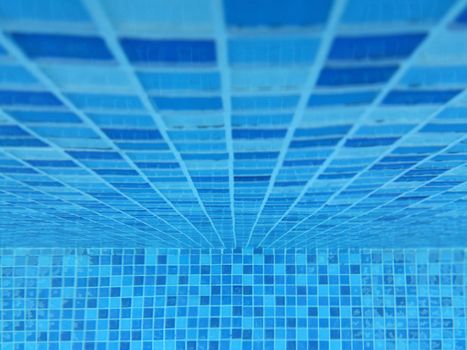 Mosaic tiles blue pattern of swimming pool