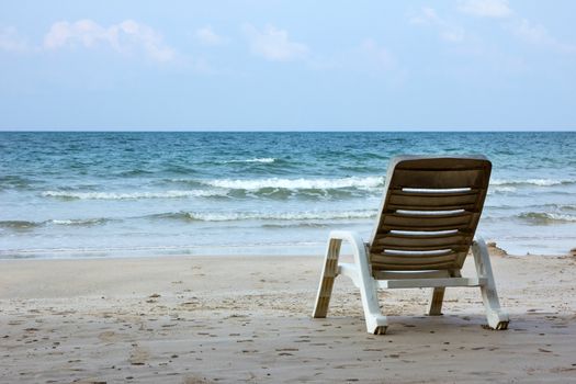 Plastic chairs on a beach