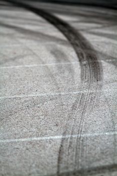 Background with tire marks on road track