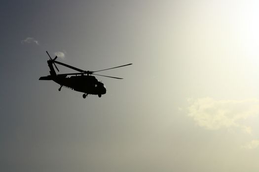 Helicopter at sunset with sun view