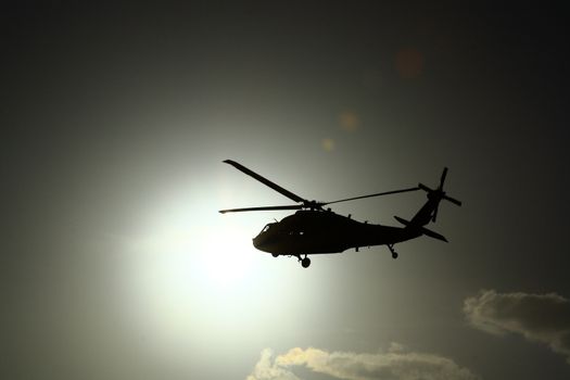 Helicopter at sunset with sun view