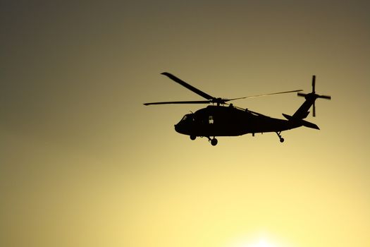 Helicopter at sunset with sun view