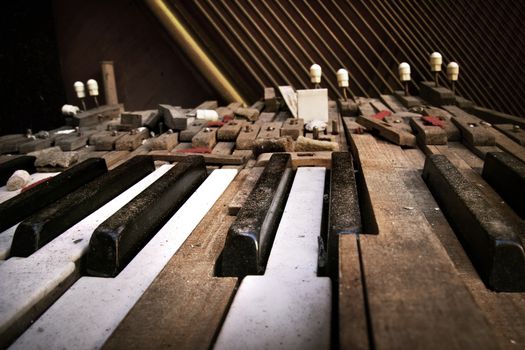 Keyboard of old broken piano (close-up view)