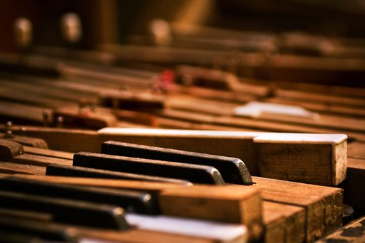 Keyboard of old broken piano (close-up view)