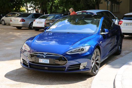 Nice, France - May 15, 2016: Blue Tesla Model S P90D Car Parked in Front of the Nice Orthodox Church