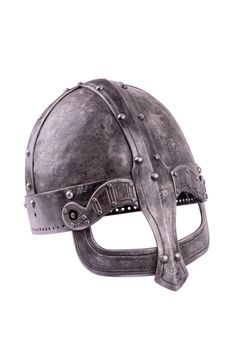 Old forged Viking helmet isolated on a white background.