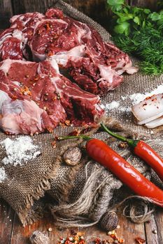 slice of fresh beef marinated in spices on burlap