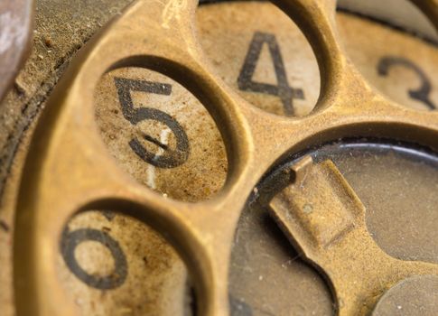 Close up of Vintage phone dial, dirty and scratched - 5, perspective