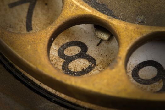 Close up of Vintage phone dial, dirty and scratched - 8, perspective