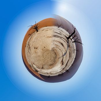 beautiful sunrise landscape of hidden Dead Vlei in Namib, blue sky, best place of Namibia. Beautiful Little planet with blue sky, ecology concept. Tiny green planet. Save Africa project