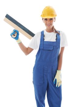 Young beautiful handywoman with masonry trowel isolated on white