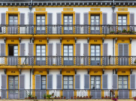 Building facade on Plaza de la Constitucion in San Sebastian, Spain
