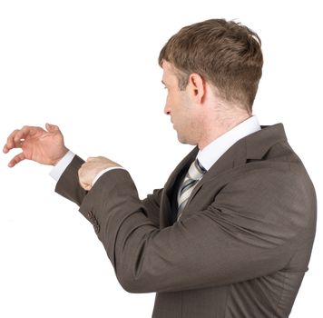 Holding something of hand shape on white background. Businessman catching something.
