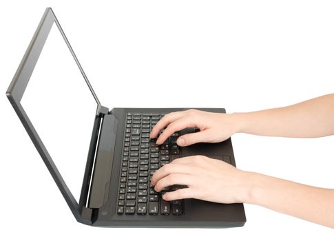 Female hands using laptop on isolated white background