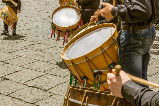 detail of some drummers men in a day of celebration