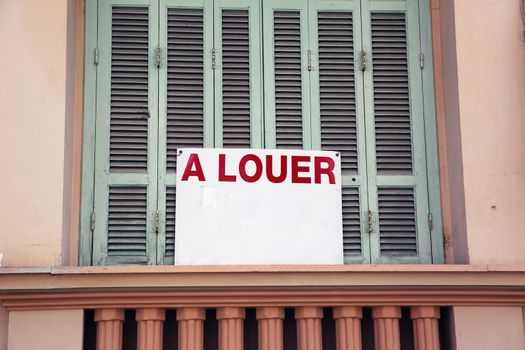 Apartment For Rent Sign in Front of an Apartment Building in Nice, France