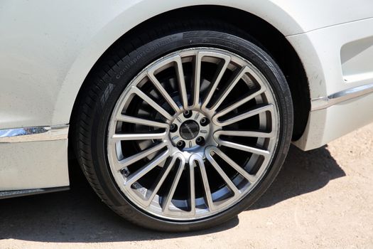 Nice, France - May 15, 2016: Wheel and Braking System Components of a Luxury Continental GT Mansory Parked in Front of the Nice Orthodox Church