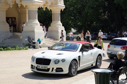 Nice, France - May 15, 2016: White Continental GT Mansory Parked in Front of the Nice Orthodox Church