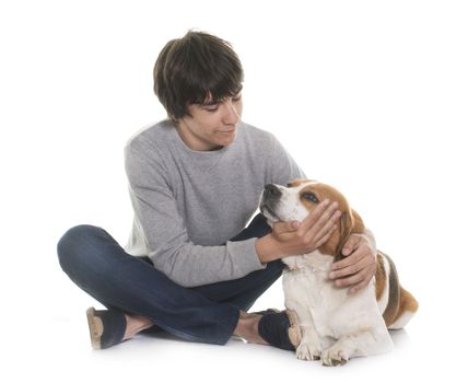 adult beagle and teenager in front of white background