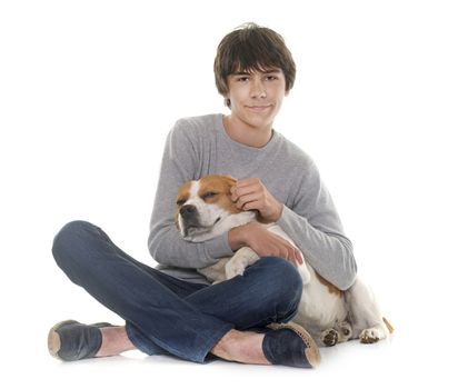 adult beagle and teenager in front of white background