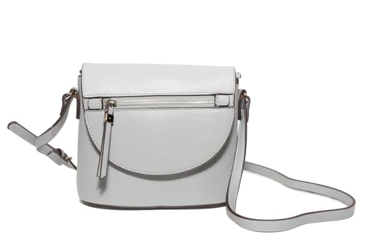 The photograph shows a female handbag on a white background