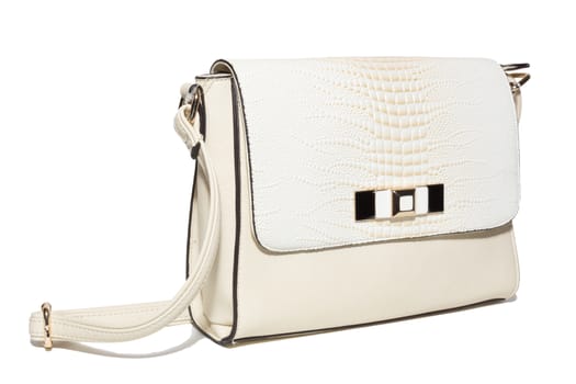 The photograph shows a female handbag on a white background