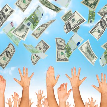 Many dollars falling on business people hands on blue background