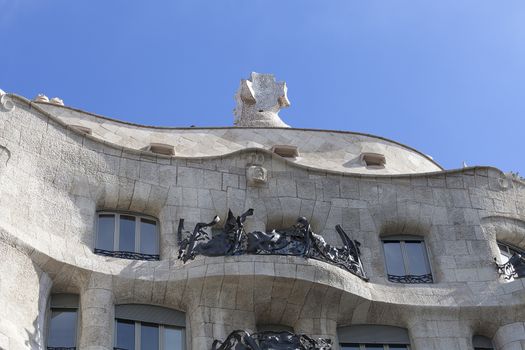  Casa Mila known as La Pedrera - facade with balconies of modernist building designed by Antoni Gaudí,  Barcelona, Spain