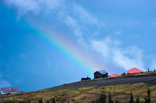 Mountain landscape with a rainbow