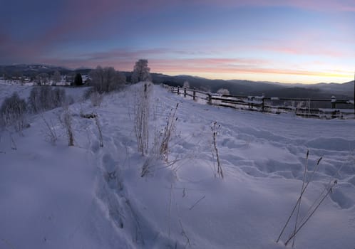 Carpathian mountain valley covered with fresh snow. Majestic landscape. Ukraine, Europe