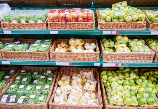 Fresh fruits on shelf in supermarket. For healthy concept