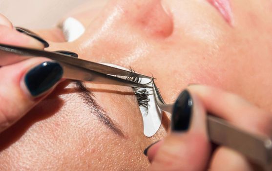 eyelash extension process, the beauty industry beauty salons lashes  very soft focus