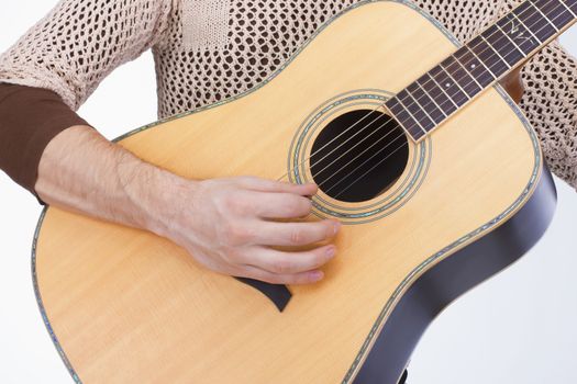 guitar hand of guitarist playing guitar yellow