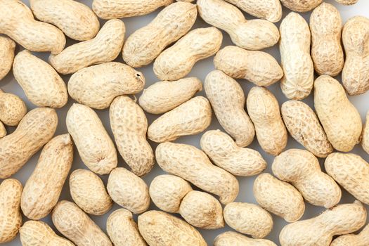 groundnut in the skin close-up on a white background
