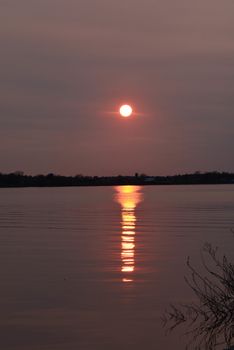Sunset over northern lake