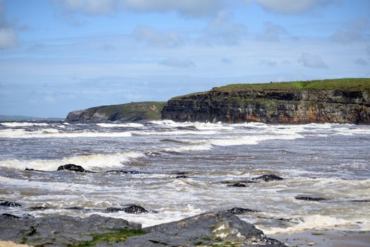 waves and cliffs on the wild atlantic way in Ballybunion county Kerry Ireland