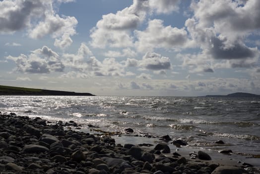 blue clouds over the rocky beal beach in county kerry on the wild atlantic way