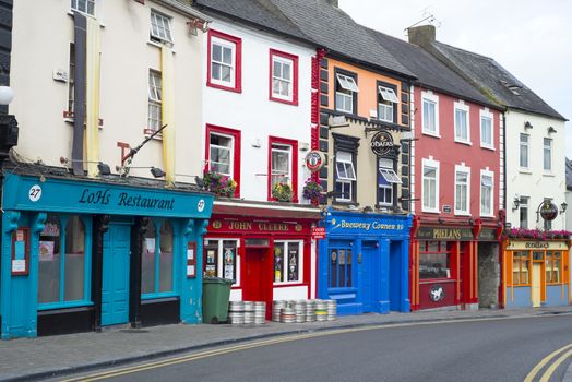 pubs and retaurant fronts on a kilkenny city high street in ireland