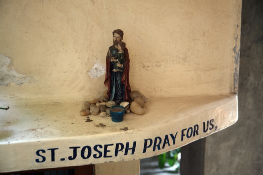 Saint Joseph holding baby Jesus, Nirmal Hriday, Home for the Sick and Dying Destitutes, one of the buildings established by the Mother Teresa and run by the Missionaries of Charity in Kolkata, India on January 24, 2009.