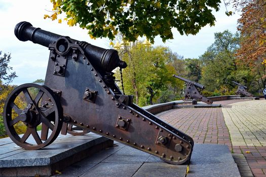 The ancient cannon in Chernigov city park early autumn