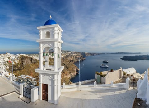 Blue and white orthodox church bell tower. Firostefani, Santorini Greece. Copyspace